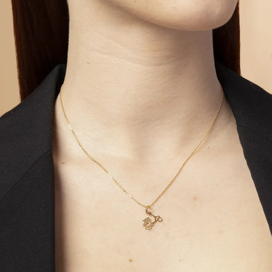 Yellow gold motorcycle pendant