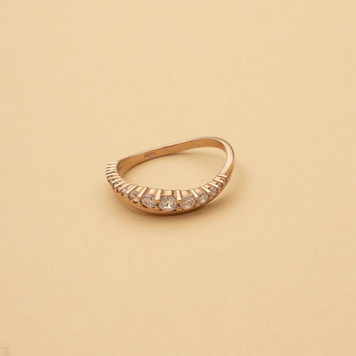 Red gold ring with cubic zirconia