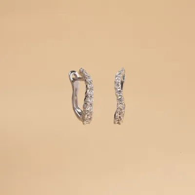 White gold one line earrings with cubic zirconia