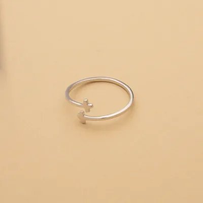 White gold ring with crosses