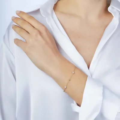 Yellow gold bracelet with pearls