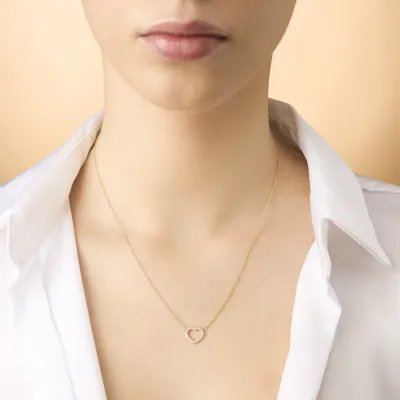 Yellow gold neclace with heart-shaped pendant with cubic zirconia