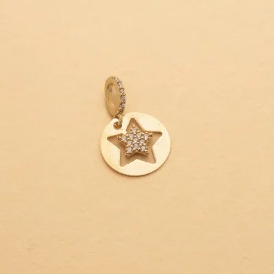 White and yellow gold star-shaped pendant with cubic zirconia