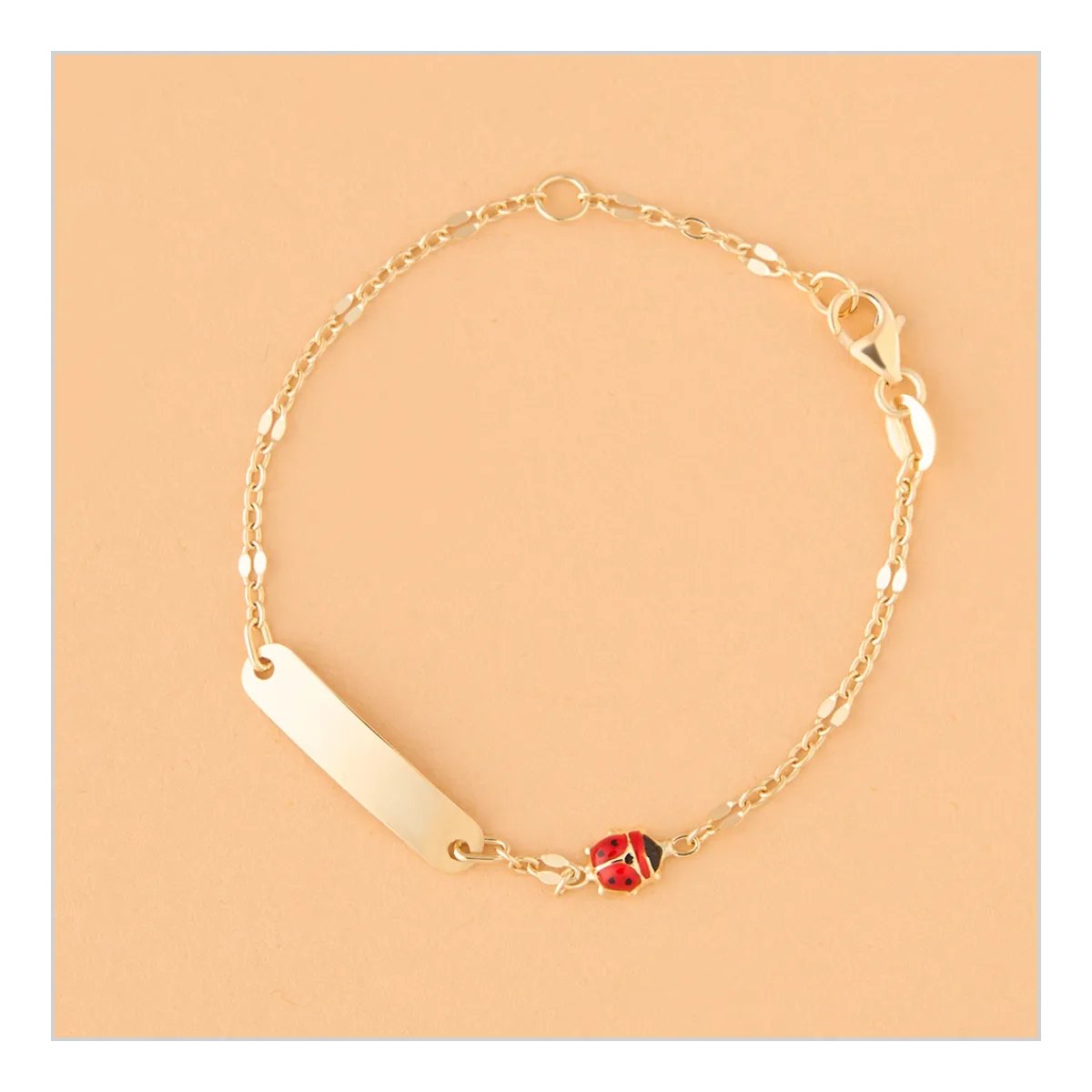 Yellow gold children's bracelet with enameled ladybugs