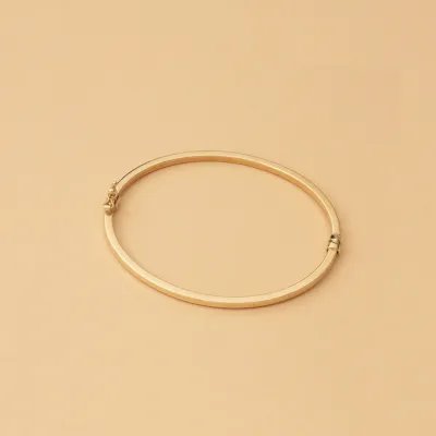 Yellow gold squared tube bangle bracelet