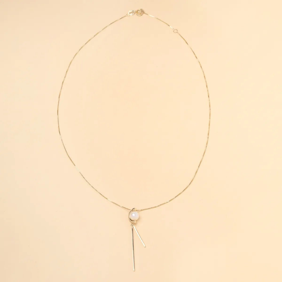 Yellow gold "Aurora" necklace with pearl