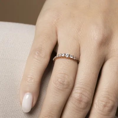 Red gold wavy ring with cubic zirconia