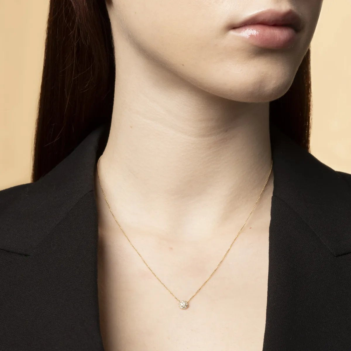 Set (necklace + earrings) in yellow gold with cubic zirconia