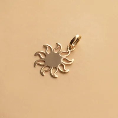 Yellow gold sun-shaped pendant