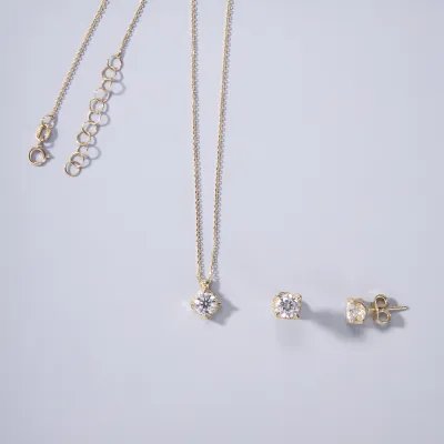 Yellow gold set (necklace + earrings) with cubic zirconia