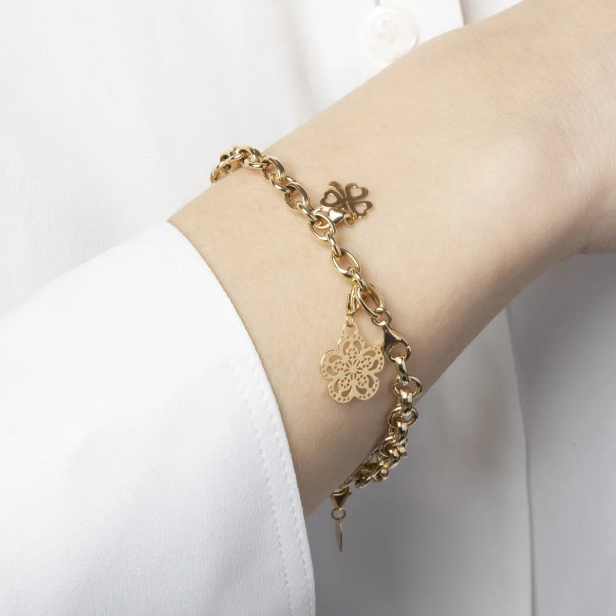 Yellow gold four-leaf clover charm pendant