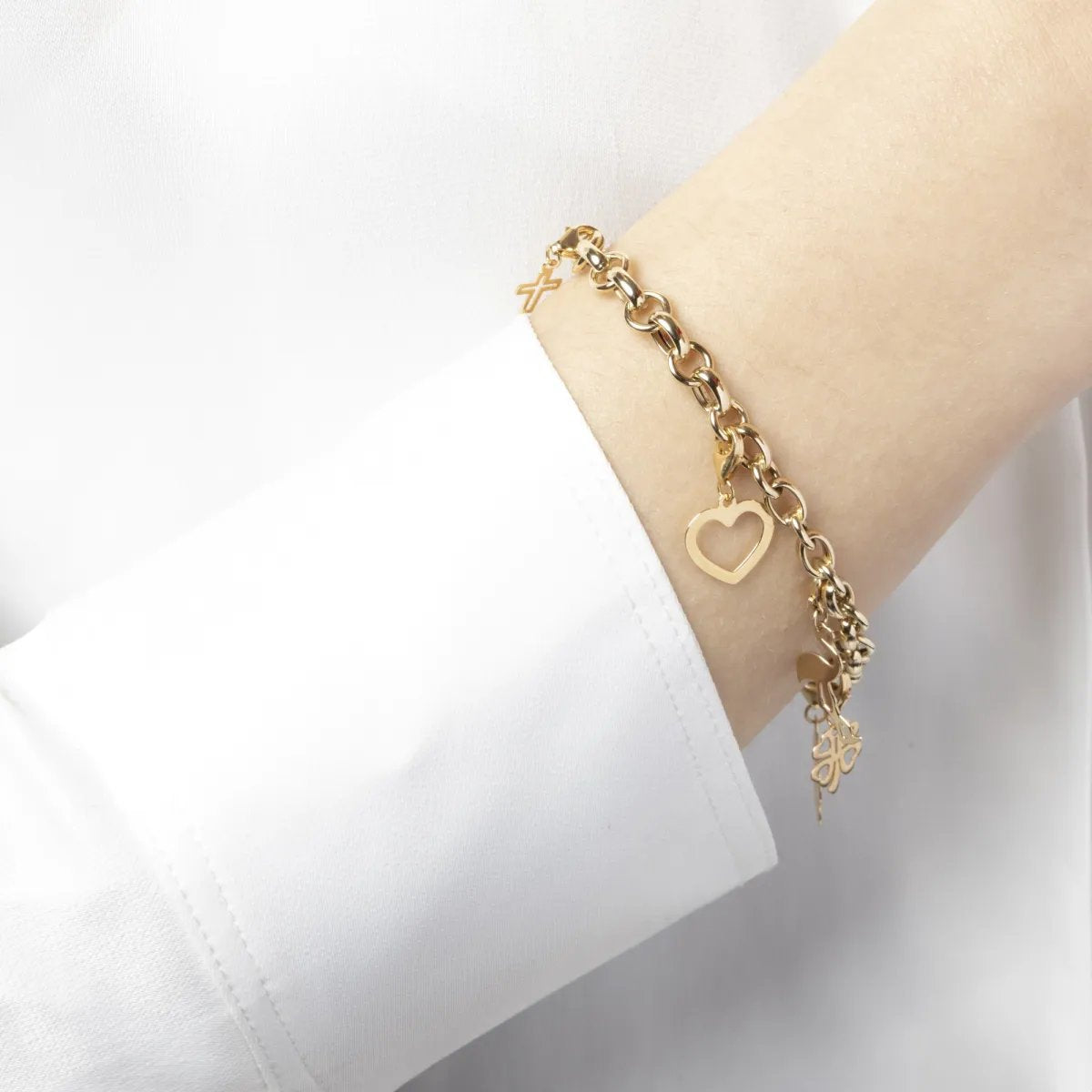 Yellow gold heart-shaped charm pendant