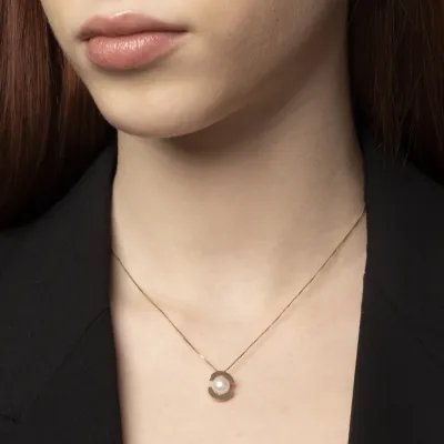 Yellow gold "Aurora" necklace with pearl