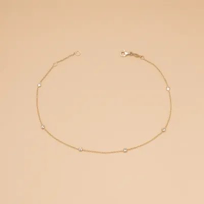 Yellow gold anklet with cubic zirconia