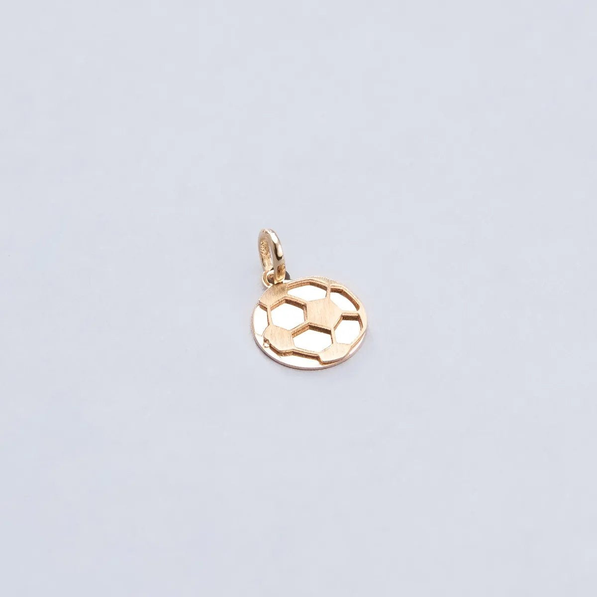 Yellow gold "soccer ball" pendant