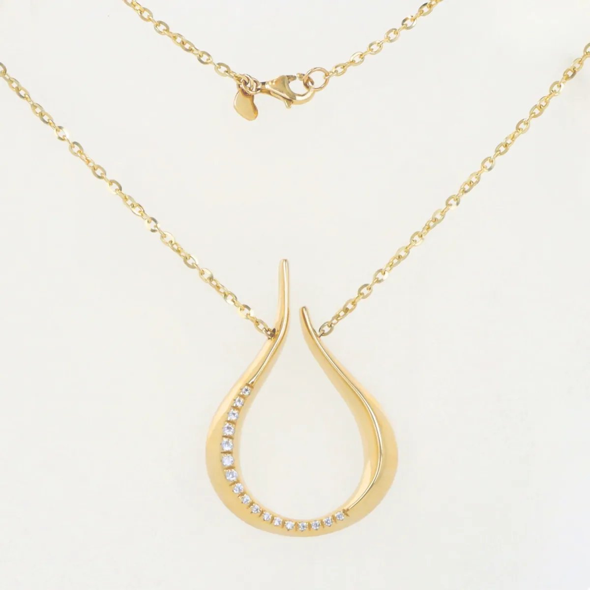 Yellow gold drop-shaped necklace with cubic zirconia