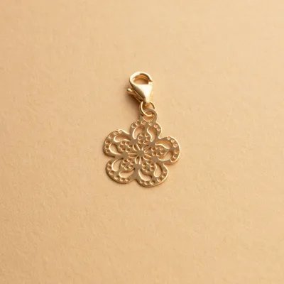 Yellow gold flower charm pendant