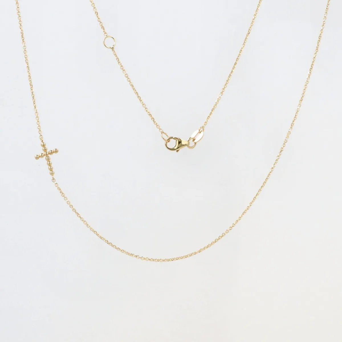 Lightweight yellow gold set with cross necklace and bracelet