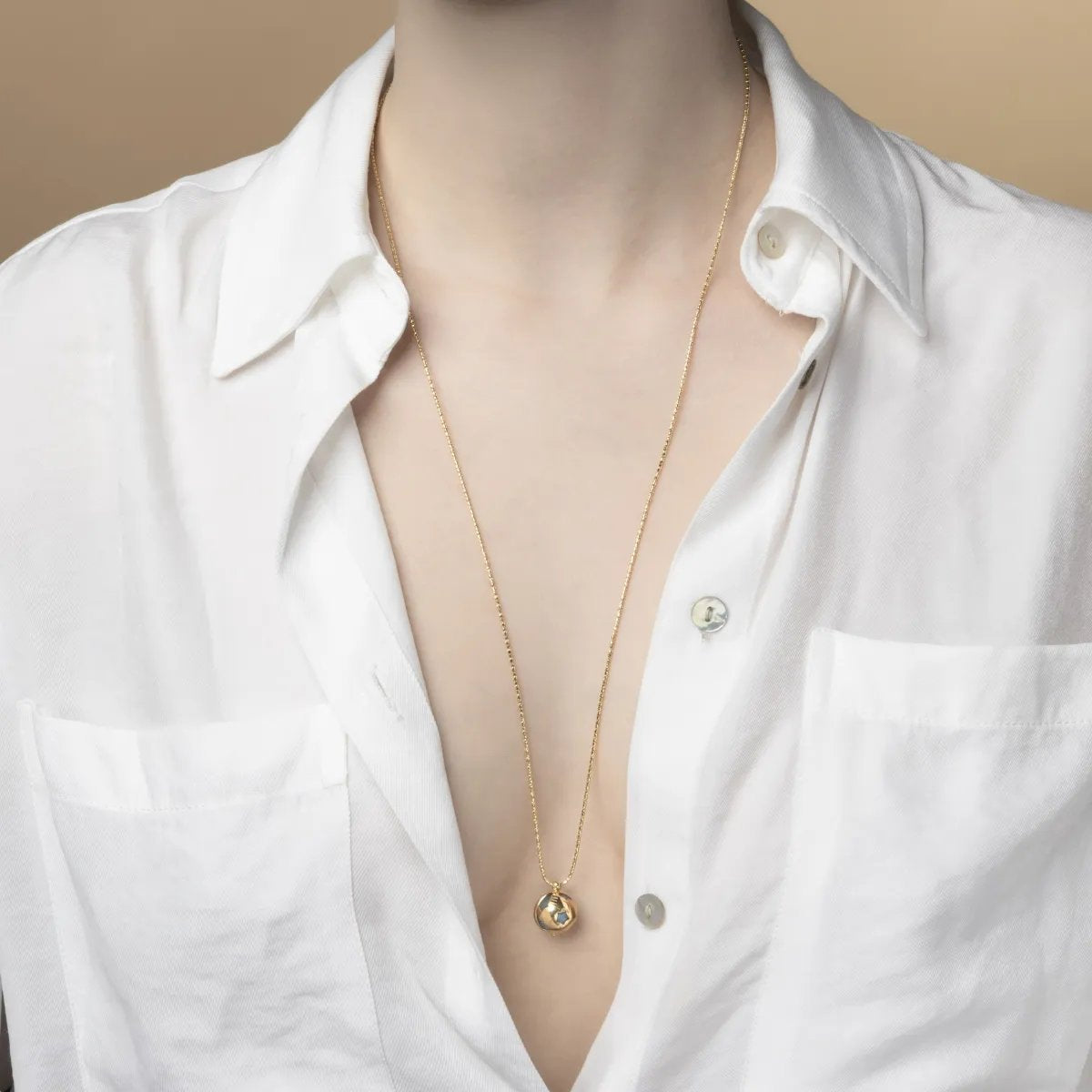 "WE" necklace with milk aquamarine
