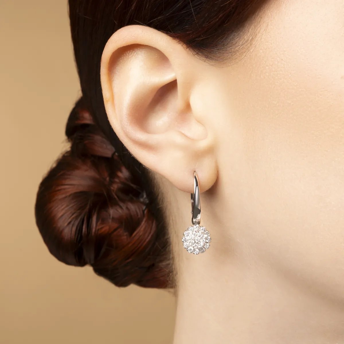 White gold rose-shaped earrings with cubic zirconia