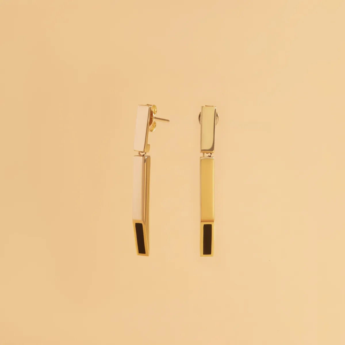 Yellow gold earrings with black enameled details from "Futura" collection
