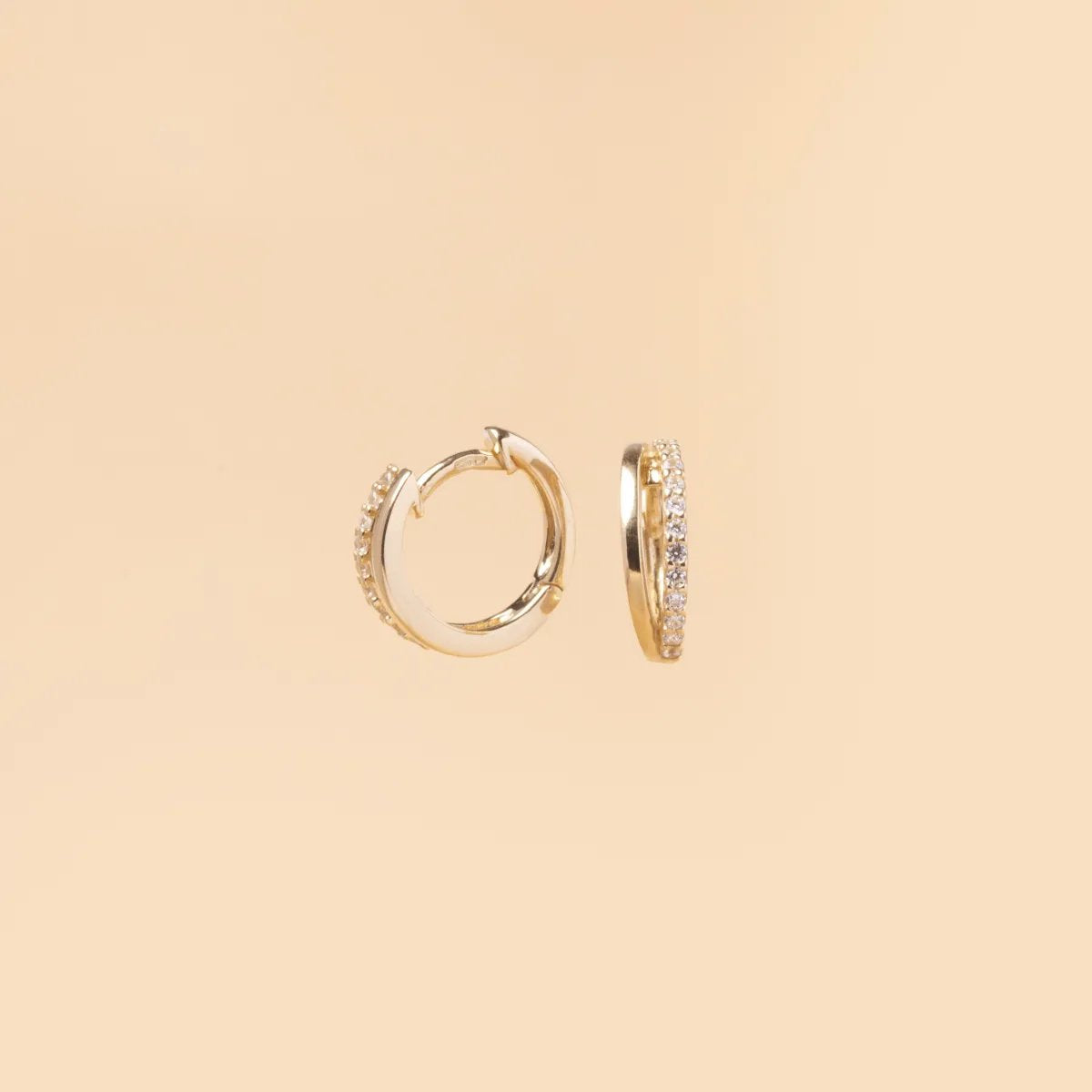 Yellow gold circular earrings with cubic zirconia