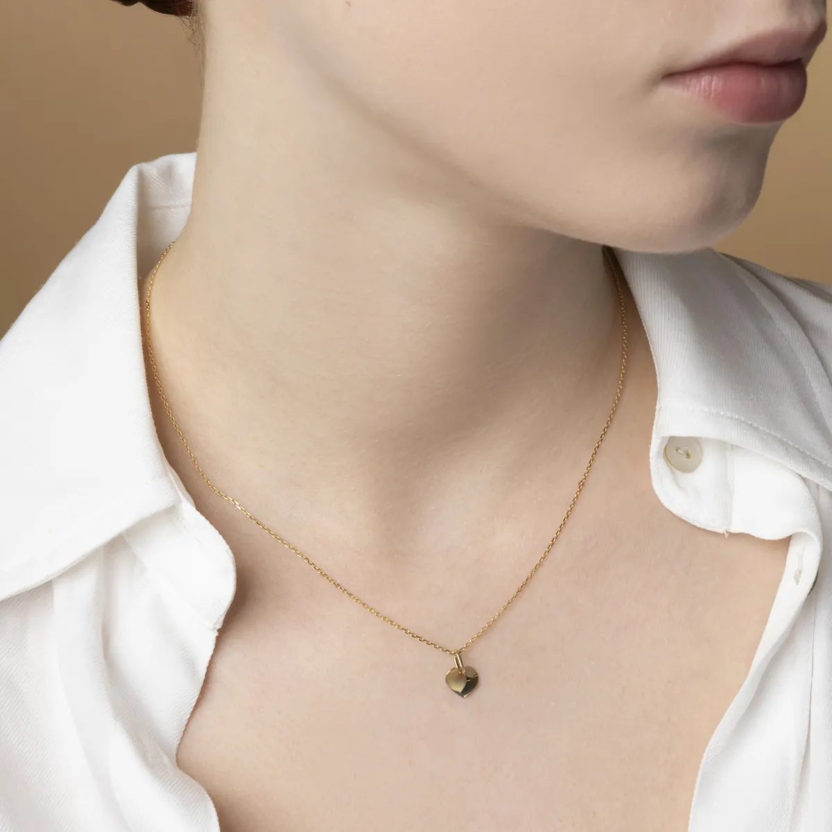 Yellow gold heart-shaped pendant