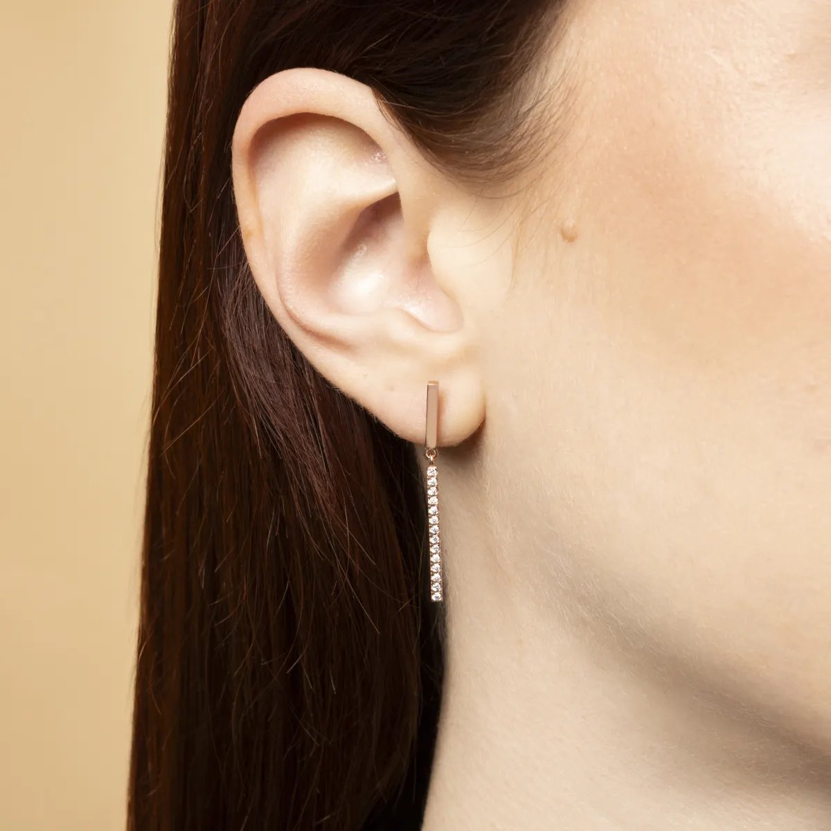 Rose gold pendant earrings with cubic zirconia