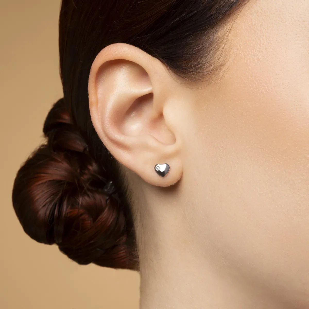 Yellow gold heart-shaped earrings with cubic zirconia