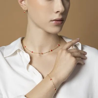Yellow gold children's set with red enamelled hearts