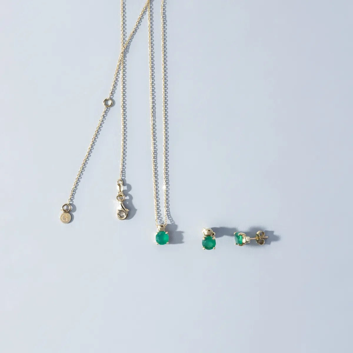 Yellow gold earrings and necklace set with natural stones